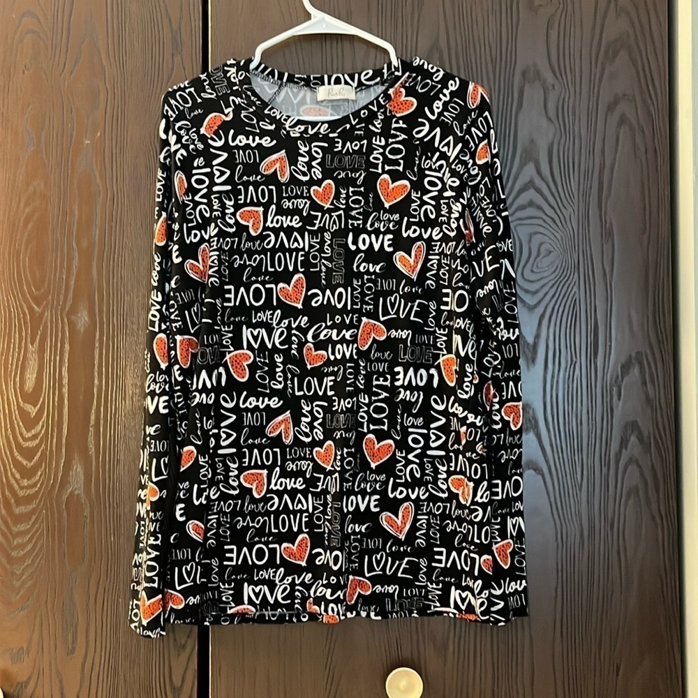 Riah lightweight black sweater with hearts and love. Long sleeved. Size Medium.